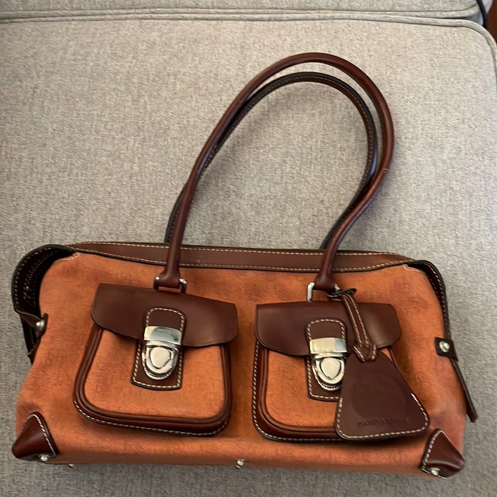 Dooney & Bourke Double Pocket Signature Satchel in burnt orange and brown.